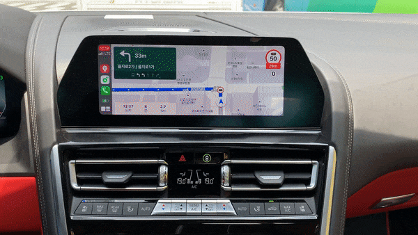 BMW 840i는 온도 조절 같은 운전시 자주 활용하는 '공조'시스템은 버튼으로 조절할 수 있게 디자인됐다./사진=이강준 기자