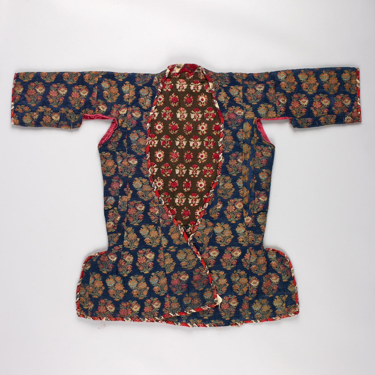 <Jacket>, 1800–60, Iran (Qajar), woven silk and metal thread lined with European roller-printed cotton © William Morris Gallery, London Borough of Waltham Forest